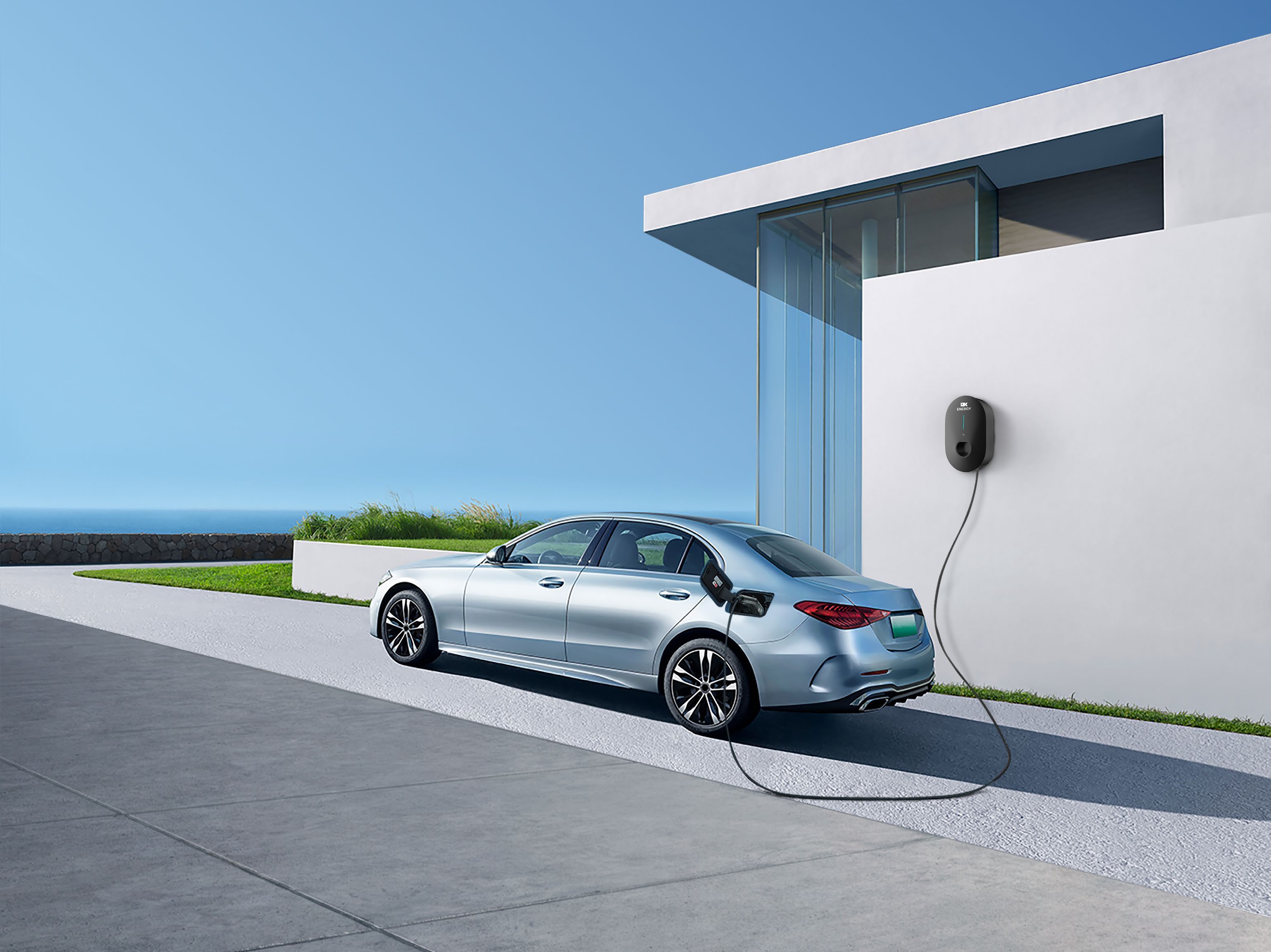 Manufacturer illustration of an electric car connected to a DX wall charger at home